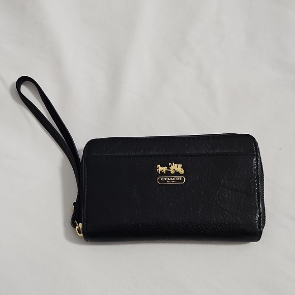 Coach Handbags - Coach Black Leather Wristlet with Gold Accents